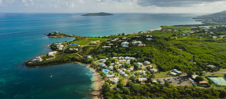 feat christies international real estate bungalows on the bay aerial 768x338
